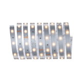 Flexible LED strip with warm white lights on silver board for modern indoor lighting solutions