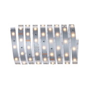 Flexible LED strip with warm white lights on silver board for modern indoor lighting solutions