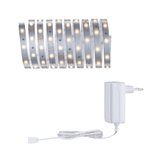 Flexible LED strip with warm white lights and white power adapter for versatile lighting solutions.