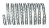 Flexible LED strip with warm white diodes on silver board for modern lighting solutions