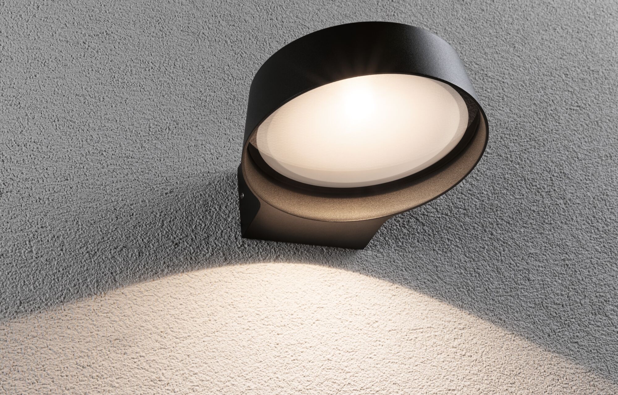 Black metal outdoor wall light with round diffuser and warm white LED for house facades.