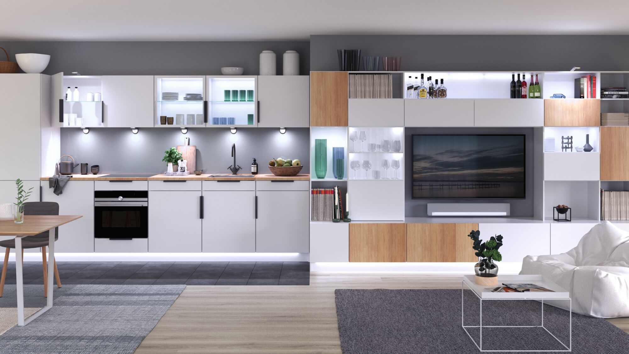 Cuisine blanche moderne avec plan de travail en bois et éclairage LED intégré dans un salon ouvert avec TV.
