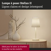 Lampe à poser Stellan II crème avec abat-jour en tissu sur buffet en bois, éclairage moderne