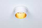 Round white metal recessed spotlight with warm white light for modern indoor lighting