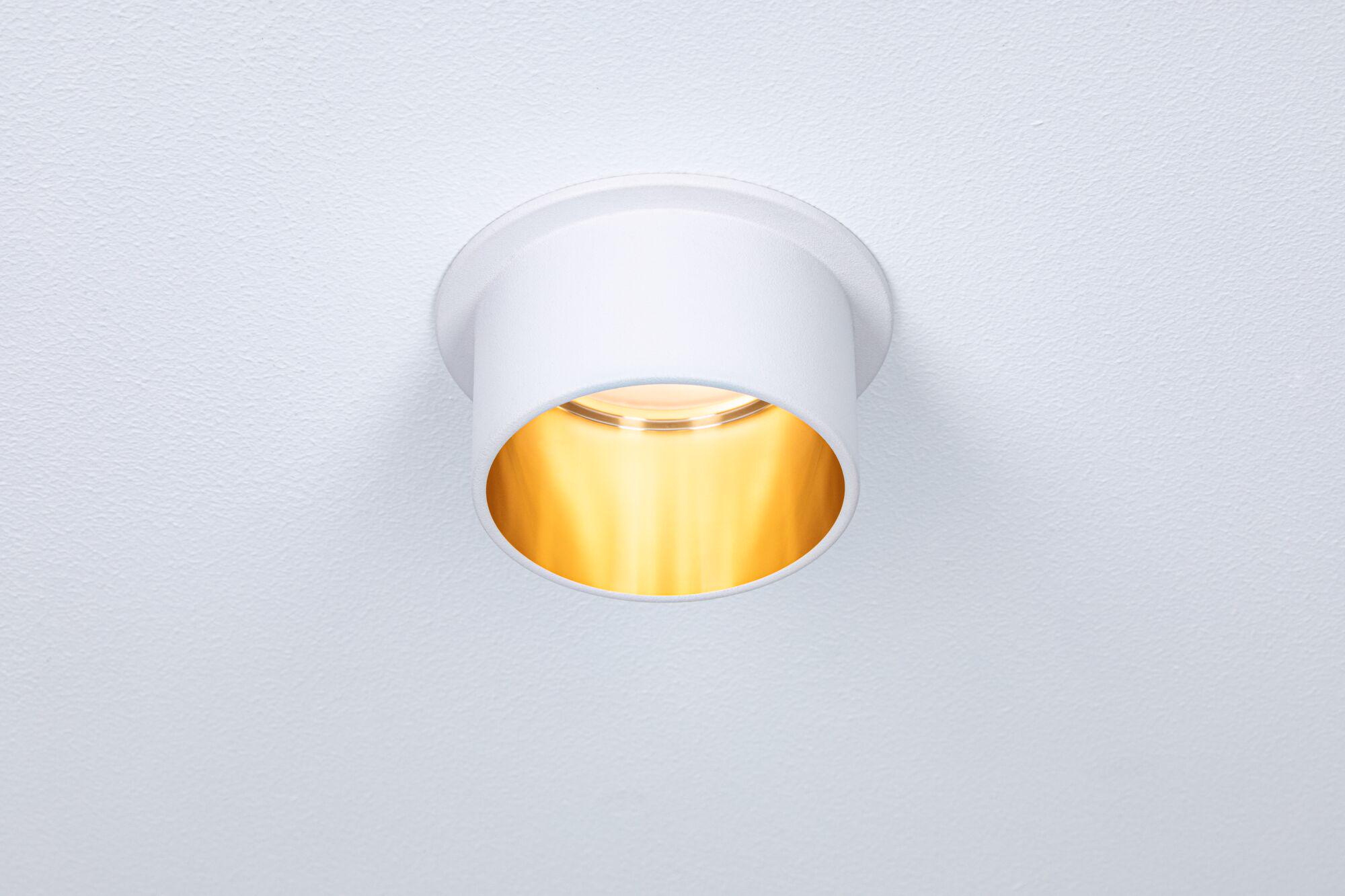 White metal recessed spotlight with warm light for modern indoor lighting solutions