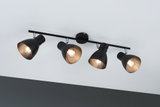 Plafonnier en métal noir avec quatre spots réglables pour un éclairage moderne.