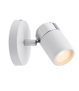 Modern white LED wall spotlight with chrome accents made of metal for focused lighting