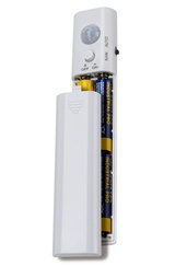 White motion sensor with battery compartment and manual or automatic switch control