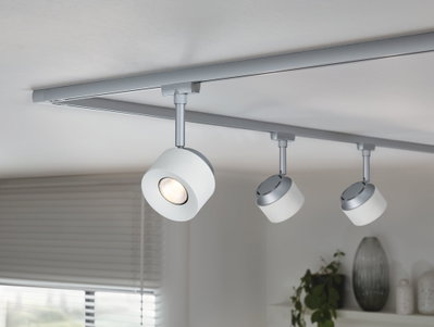 Modern white LED ceiling track with three adjustable metal spotlights for living room lighting