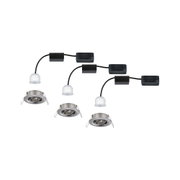Three silver metal recessed spotlights with white LED modules and black cables for indoor lighting