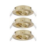 Three gold metal recessed spotlights with adjustable inner ring for focused lighting