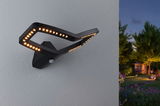 Zwarte LED-buitenwandlamp met bewegingssensor en modern ontwerp voor tuinverlichting.