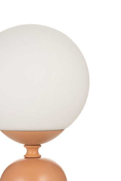 Lampe de table moderne avec verre blanc et base en métal cuivre mat pour un éclairage élégant