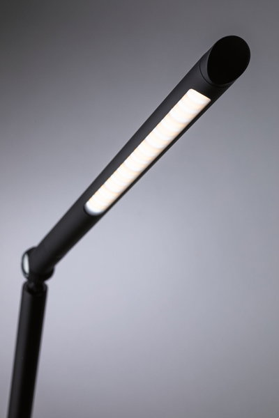 Black LED desk lamp with long slim light strip for modern workspace lighting