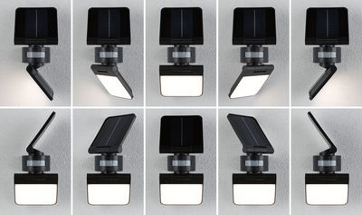 Black solar LED outdoor light with motion sensor and adjustable panel for garden and terrace lighting.