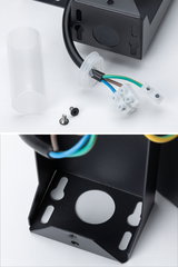 Boîtier métallique noir avec câbles électriques et vis pour installation d'éclairage LED