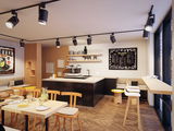 Modernes Café mit schwarzer Deckenstrahler-Beleuchtung und Holztheke in hellem Holz und Schwarz.
