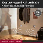 Edge LED recessed wall light with sensor and 2-metre detection range in a modern hallway setting.