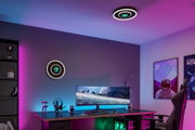 Round black LED ceiling and wall light with white ring for modern gaming room lighting.