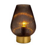 Modern table lamp with ribbed brown glass and gold metal base for ambient lighting in living spaces