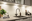 Modern white kitchen countertop with black sink and LED under-cabinet lights for kitchen illumination