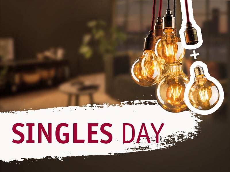 Ampoules LED chaudes avec câbles rouges sur fond flou de salon pour promotion Singles Day.