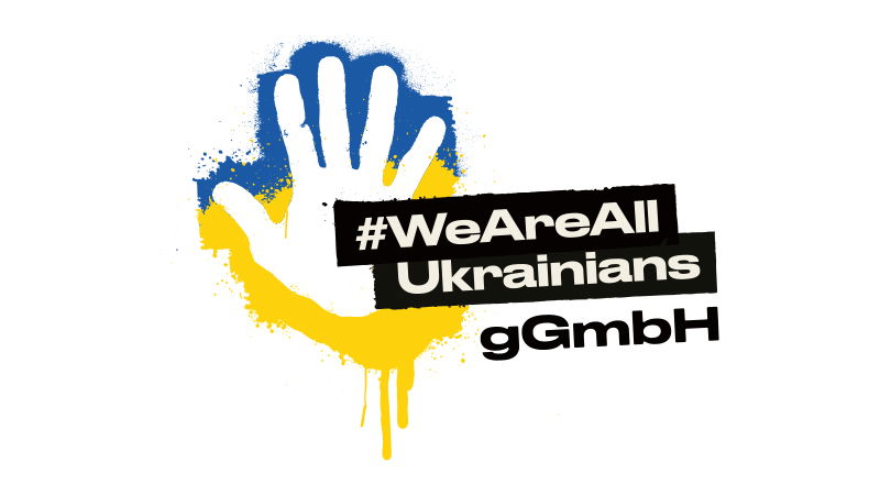 Weißer Handabdruck vor blau-gelbem Hintergrund mit Schriftzug #WeAreAll Ukrainians als Solidaritätszeichen