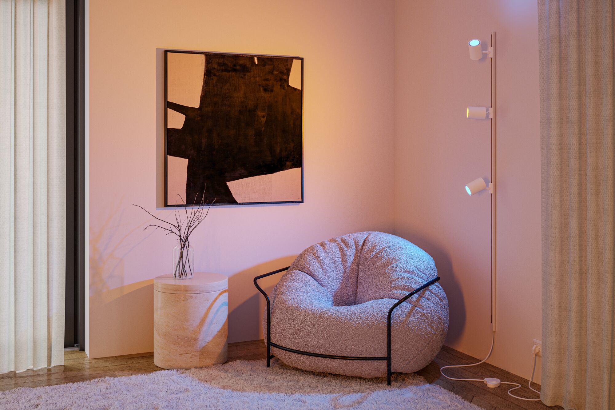 Cozy grey armchair with black metal frame beside light side table and modern wall spotlight lighting