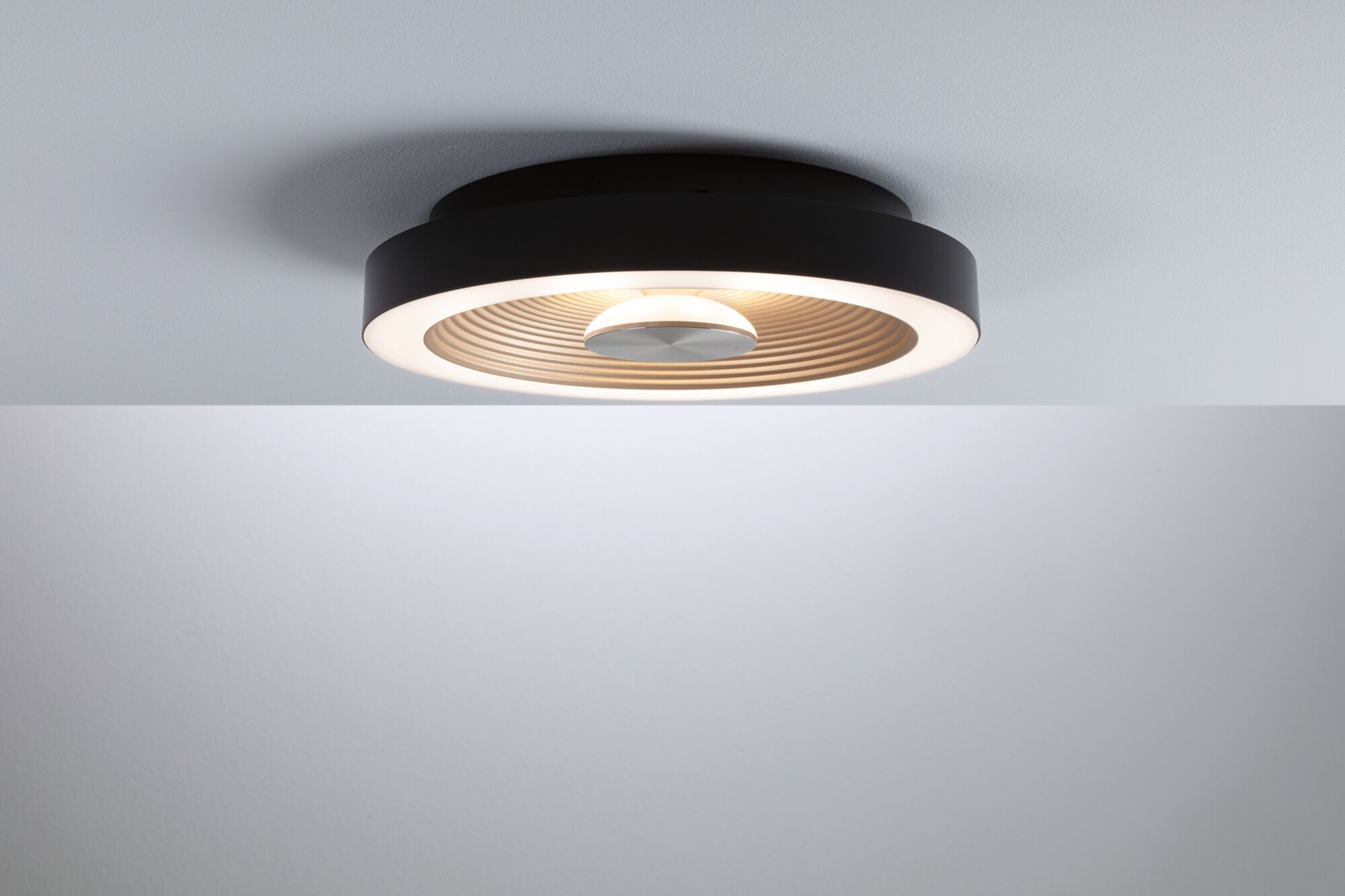 Round ceiling light in black metal with warm white LED ring and wood decor for modern lighting design.