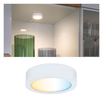 Round white LED ceiling light with adjustable warm and cool white light for living spaces.