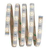 Flexibele witte LED-strip met warm wit licht en zelfklevende achterkant voor binnenverlichting.