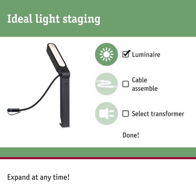 Black LED outdoor luminaire with adjustable head and cable for garden lighting solutions.