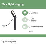 Black LED outdoor luminaire with adjustable head and cable for garden lighting solutions.