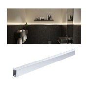 White aluminium LED profile for indirect lighting in modern bathroom with dark tiles