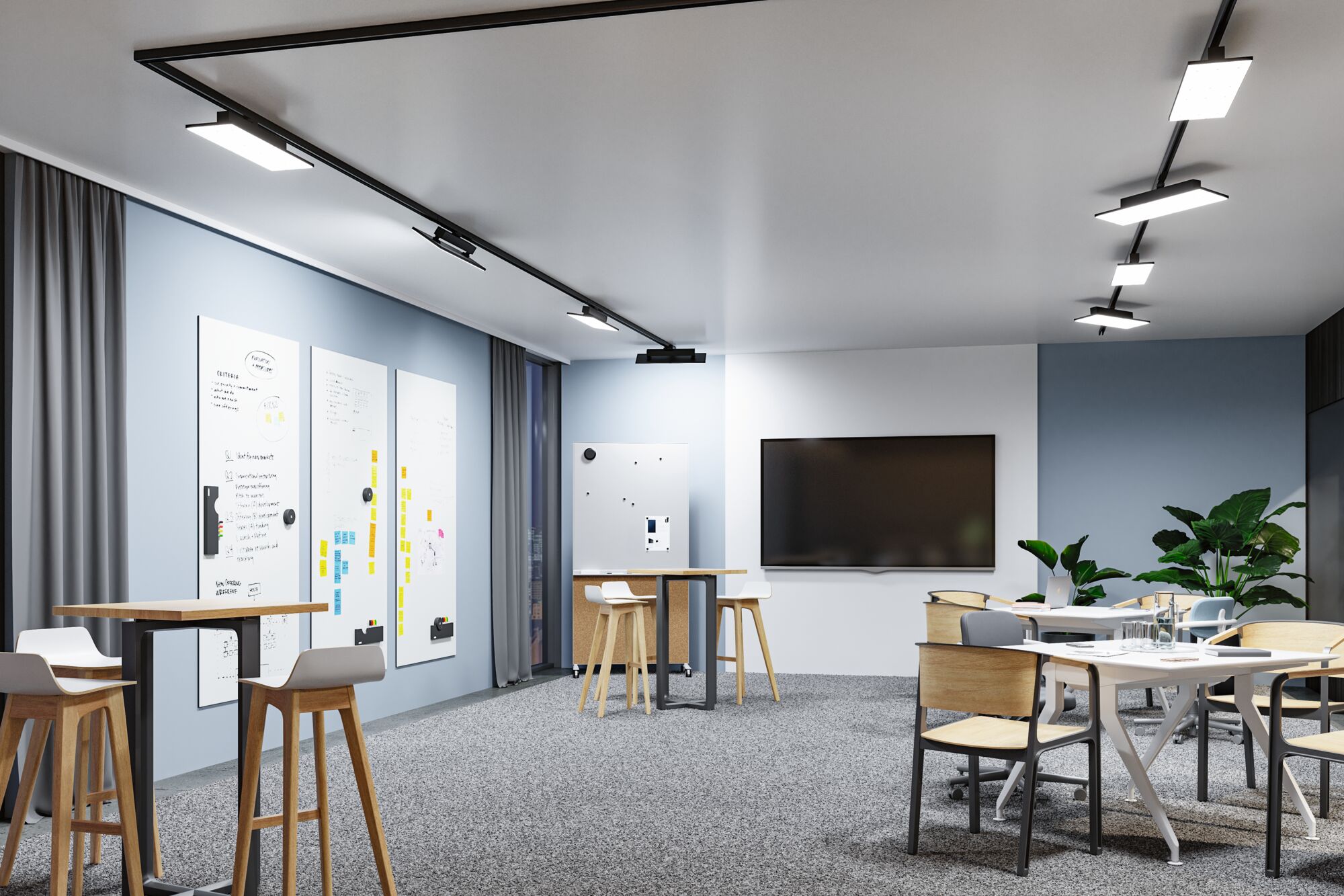 Modernes Büro mit schwarzen LED-Schienenleuchten an der Decke und hellblauen Wänden