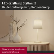 LED-tafellamp Stellan II crème met stoffen kap op houten dressoir, modern woonlicht