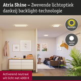 Woonkamer met Atria Shine LED-plafondlampen in neutraal wit licht en backlight-technologie
