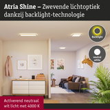Woonkamer met Atria Shine LED-plafondlampen in neutraal wit licht en backlight-technologie