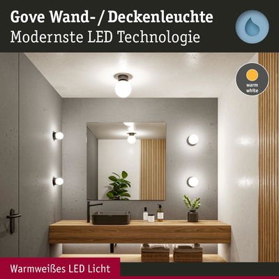 Gove LED Wand- und Deckenleuchte mit warmweißem Licht in modernem Badezimmer mit Holz und Grau