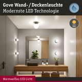 Gove LED Wand- und Deckenleuchte mit warmweißem Licht in modernem Badezimmer mit Holz und Grau