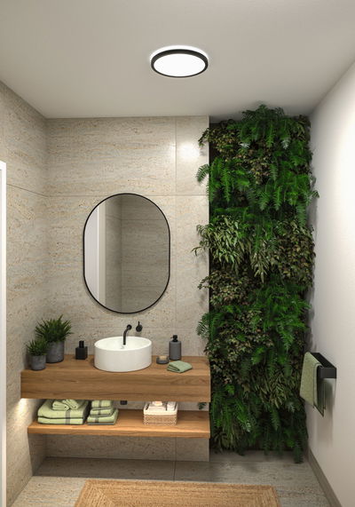 Round black-white LED ceiling light in modern bathroom with wooden vanity and green plant wall