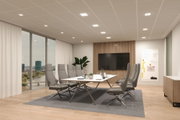 Modernes Konferenzzimmer mit grauen Bürostühlen, weißem Tisch und LED-Deckenleuchten in Bürobeleuchtung