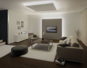 Modern living room with white indirect LED ceiling lighting for ambient room illumination