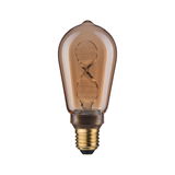 Vintage LED bulb with spiral filament in amber glass for decorative lighting effects