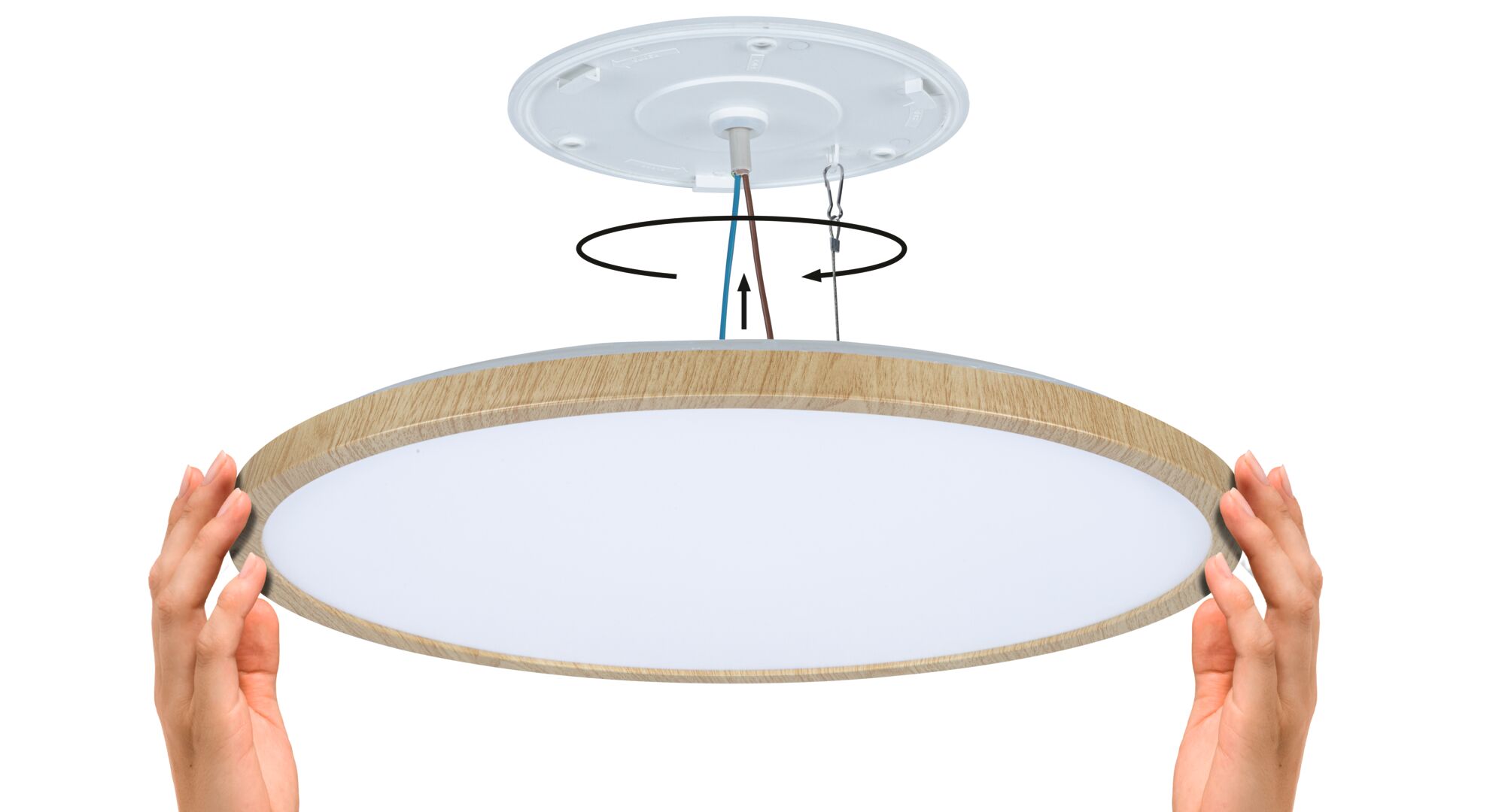 Round ceiling light with wooden frame and white diffuser, shown with installation cables and hands.