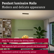 Modern black Mailo pendant light with dual light emissions and proximity sensor above dining table
