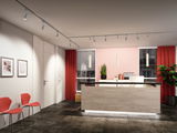 Modernes Büro mit Holztheke, roten Stühlen und weißen LED-Strahlern an der Decke für Akzentbeleuchtung
