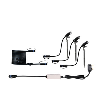 Black LED garden spotlight set with ground stakes and cables for outdoor lighting and garden illumination