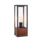 Modern table lamp with wooden base and black metal frame, clear glass panels, visible filament bulb