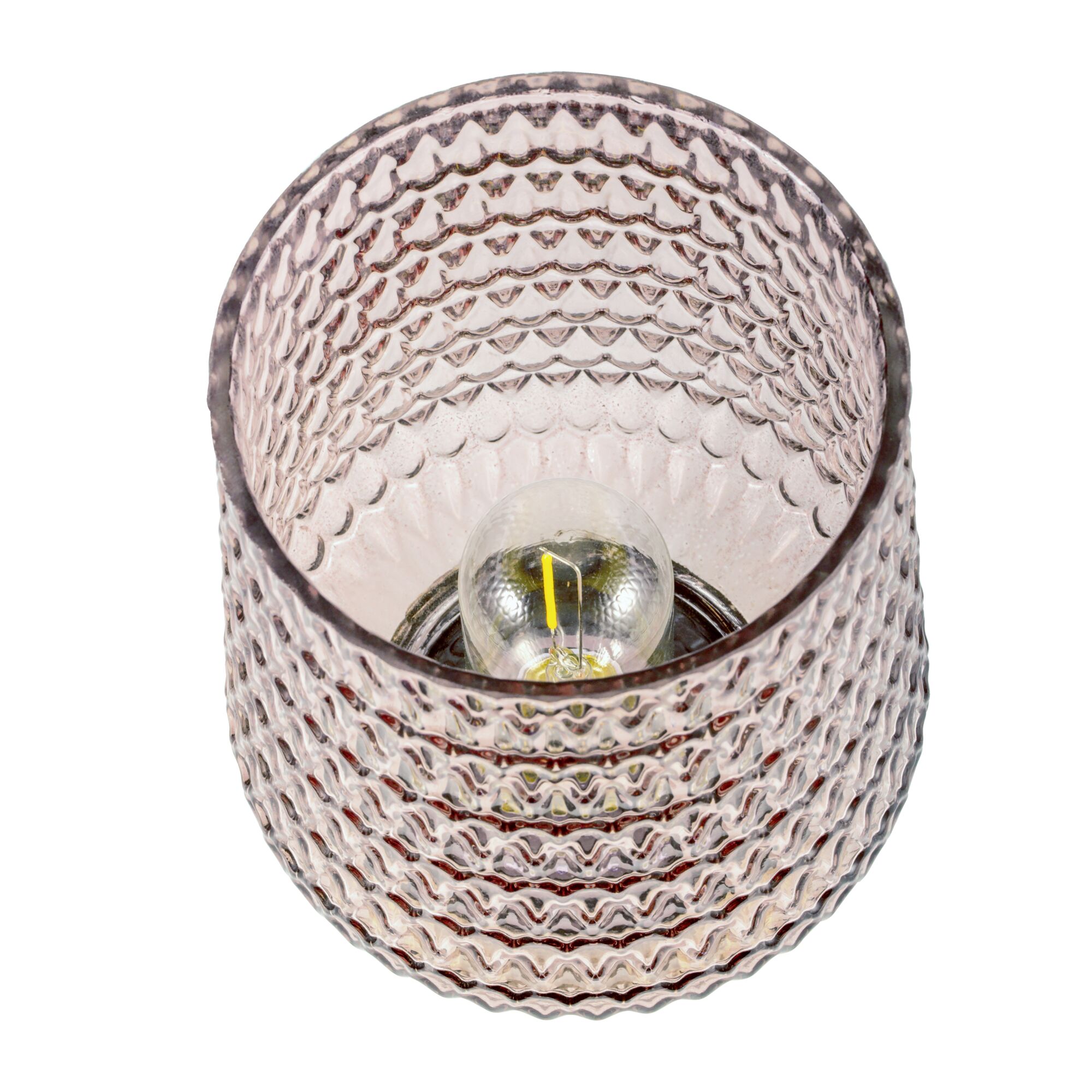 Close-up of pink textured glass lamp with visible bulb for decorative indoor lighting